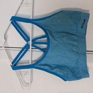 Reebok sports bra size medium bright blue strappy cross back